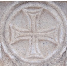 Cross with a circular frame engraved on a marble stone